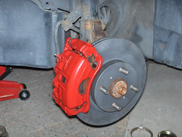 Red Corolla brake calipers