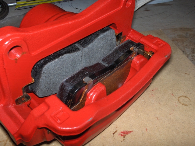 Brake caliper with brake pads installed