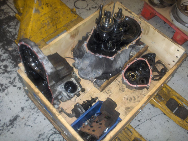 Parts of partially dismantled gearbox